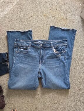 American Eagle Outfitters Blue Flare Jeans with Raw Hem